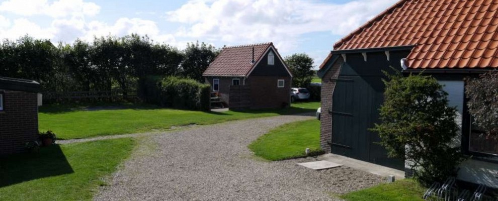 Huisje Vloed vanaf erf